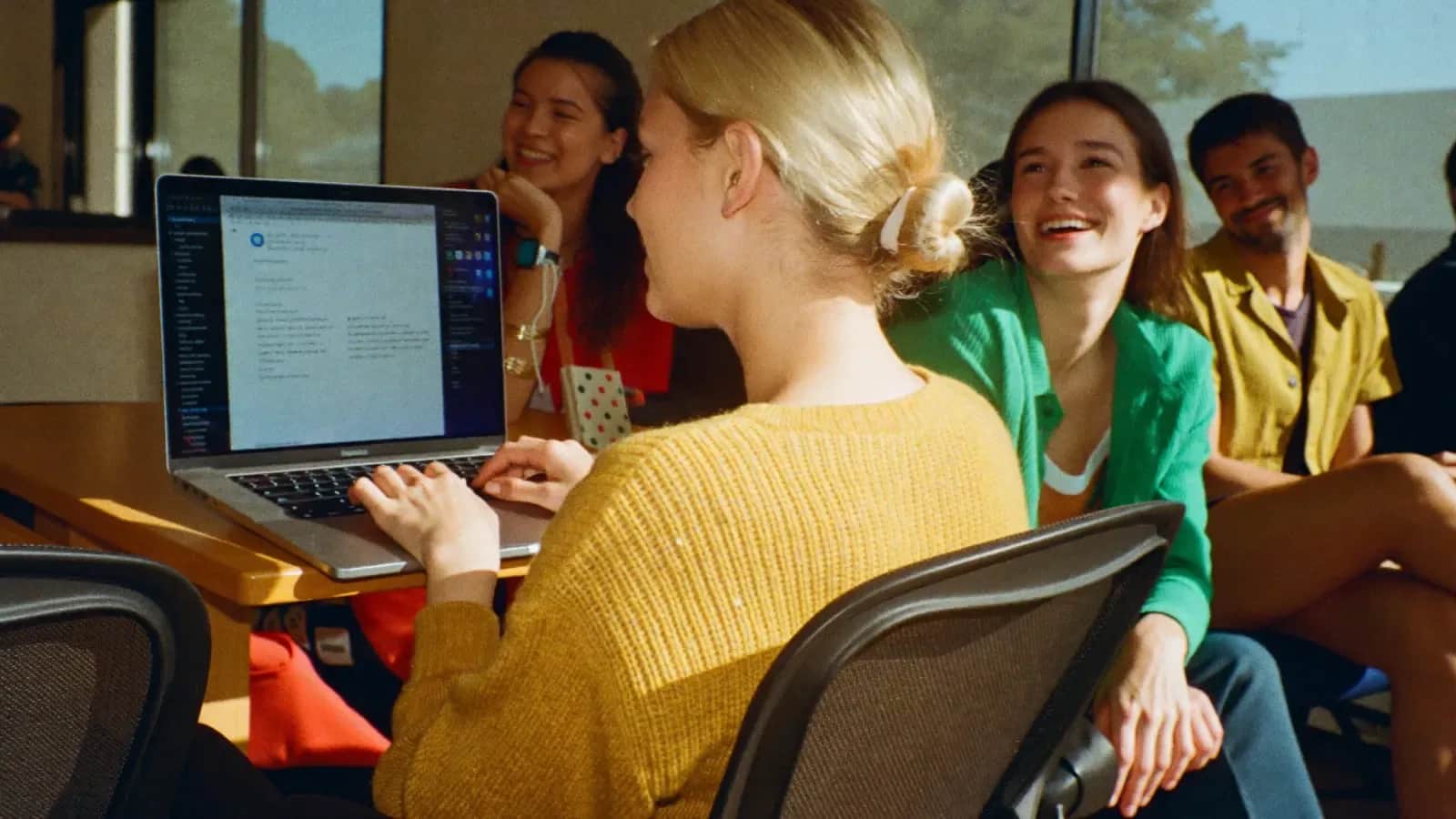 Candidate writing a work-related text during LanguageCert LTE Writing